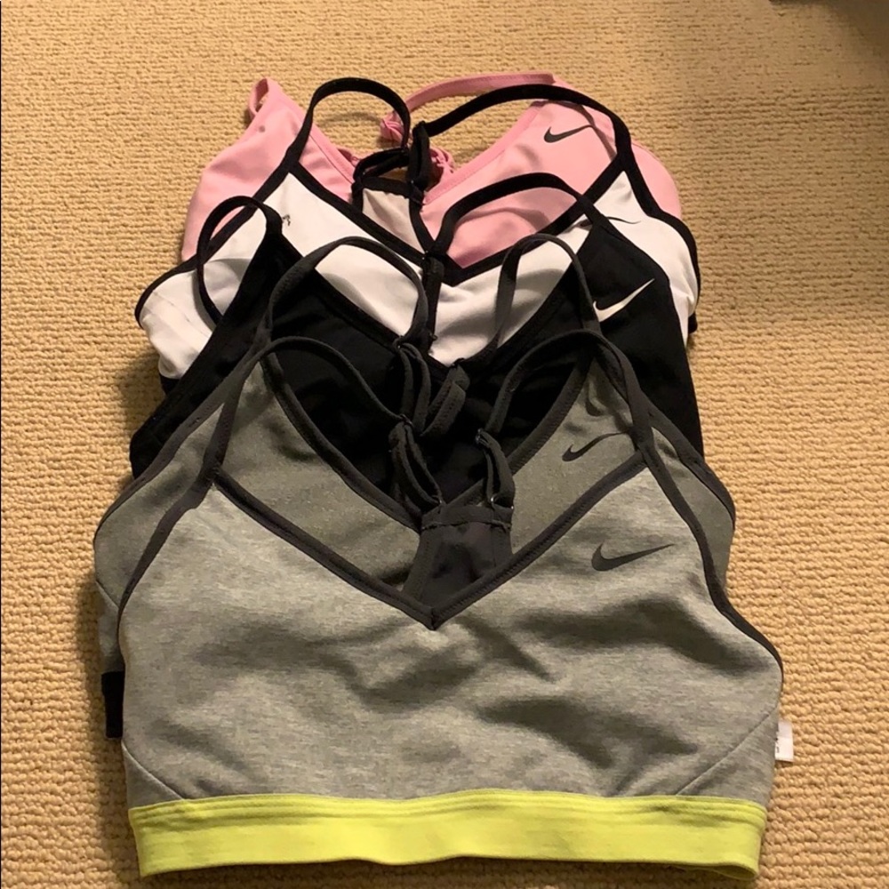 5 small NIKE Indy bras
